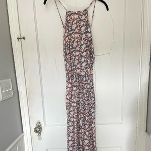 Causal jumpsuit with open back. Great for island wear.